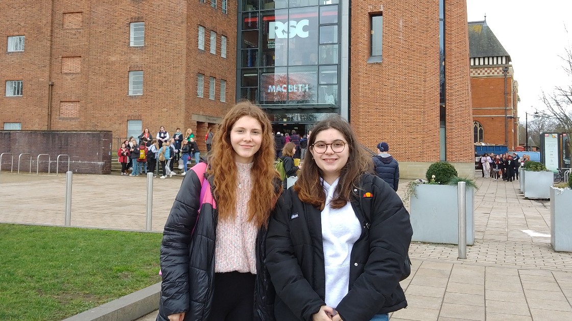 Students standing outside the theatre