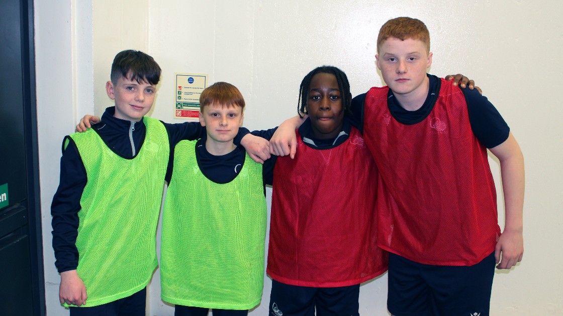 Four Year 7 boys before starting their football match.