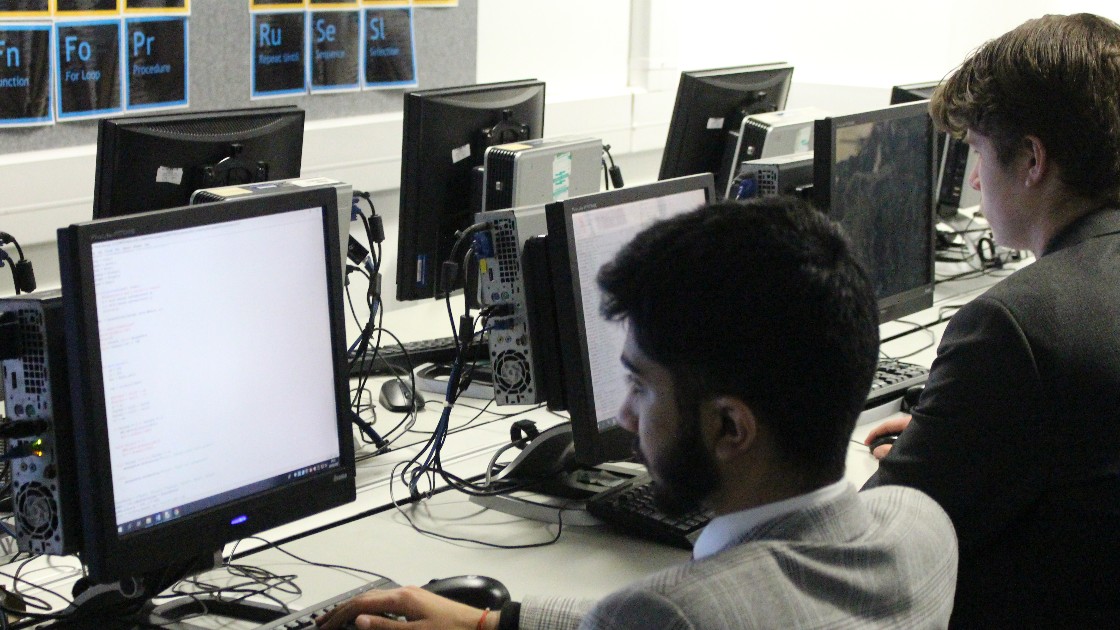 Completing the programming aspect of their coursework