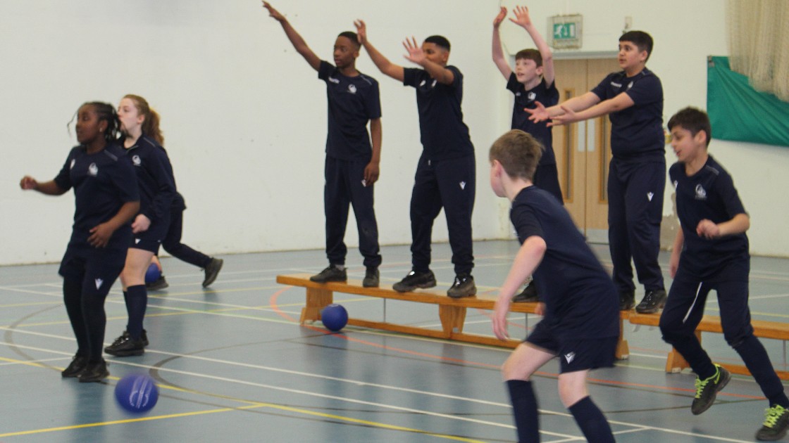 Students trying to get back into play from the bench