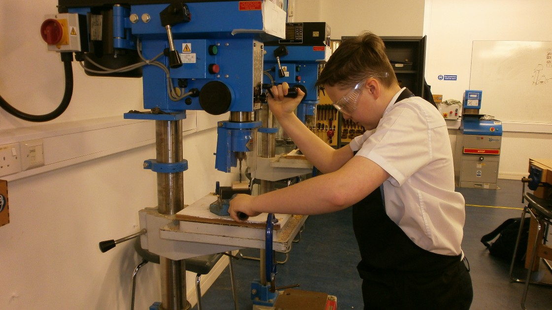 Student using the pillar drill.