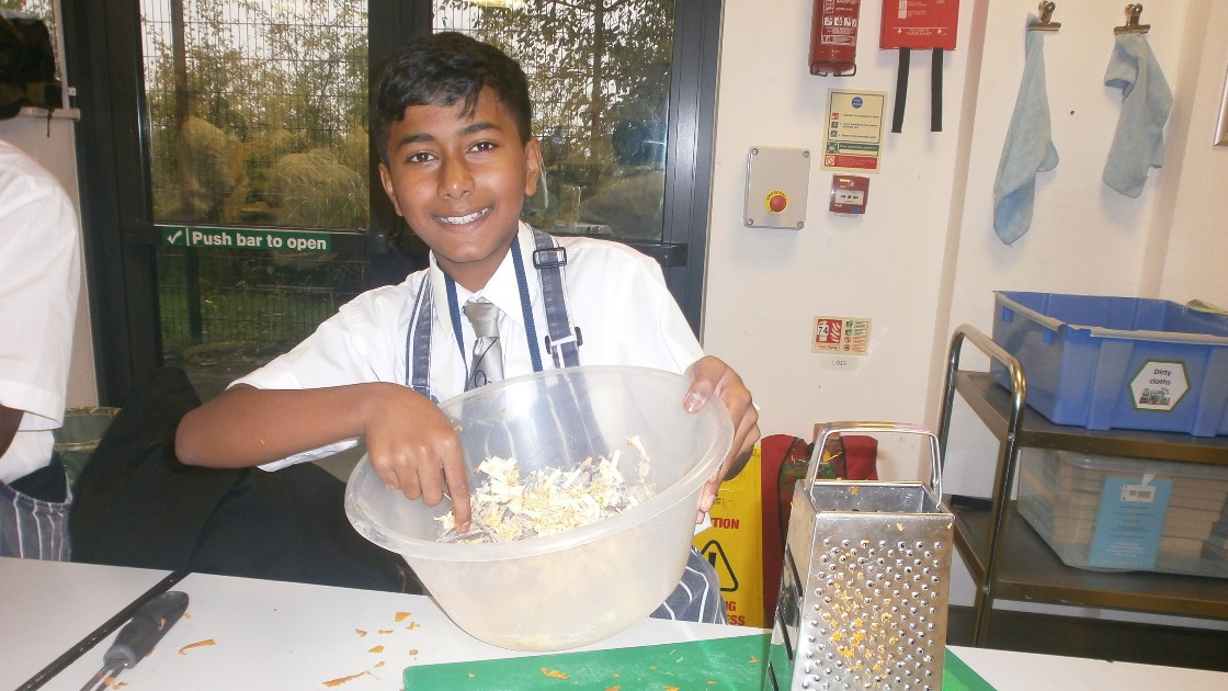 Student showing his coleslaw.