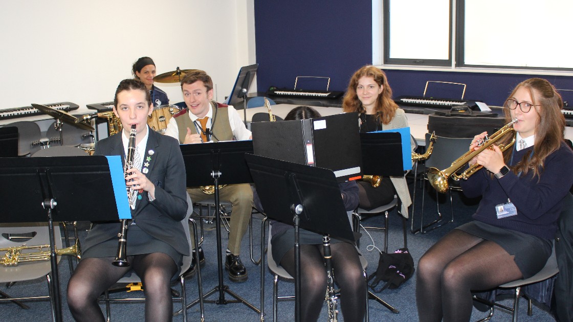 Mr Sassons with members of the Academy band.