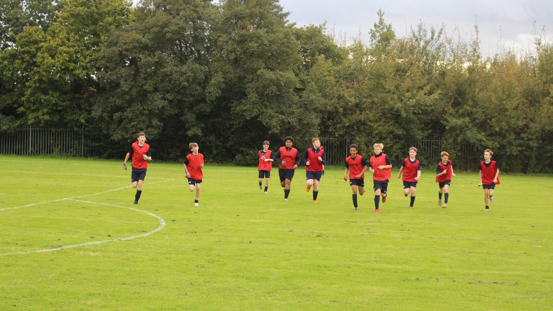 Year 8s warming up before their win against WBCA