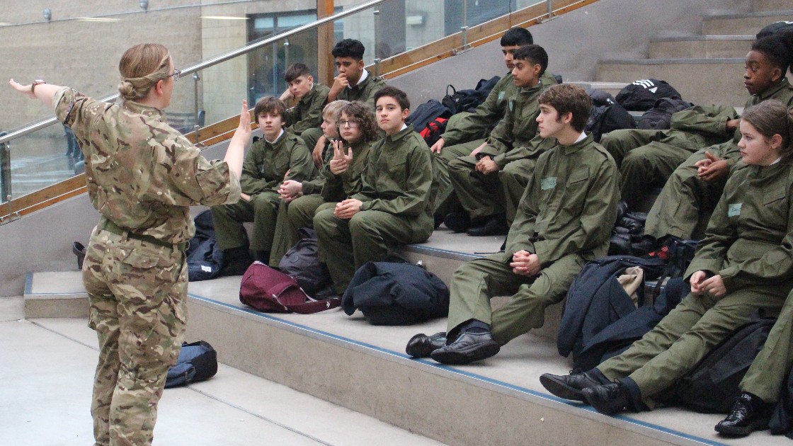 Pilot Officer Smith instructing new recruit cadets