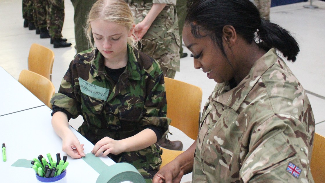 Cpl Markham-Bogle making name tags for recruits