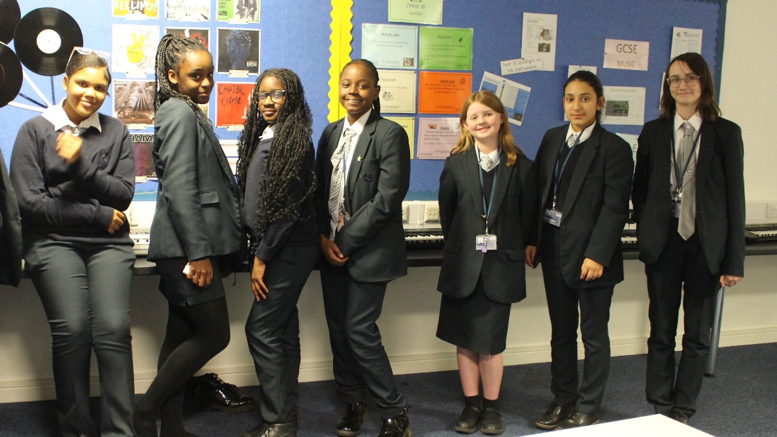 Choir Club students pose for a group photograph