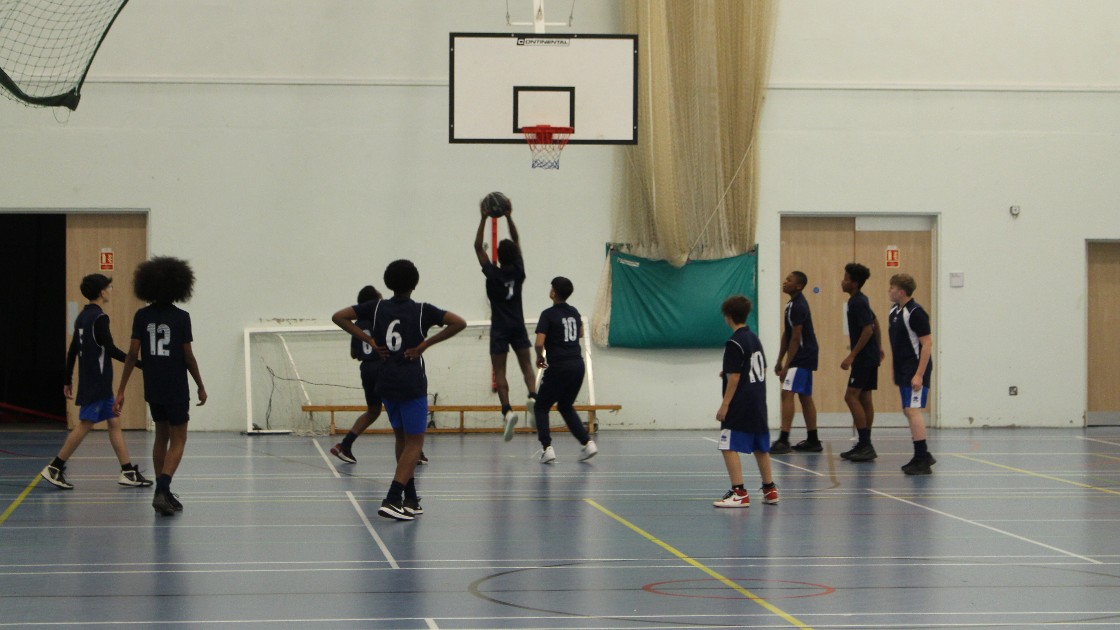 Match action. Lay- up attempt