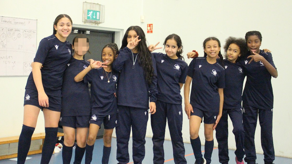 Female students posing for a photo.