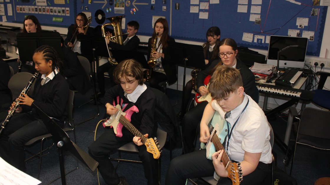 The Q3 Academy Great Barr Func are rehearsing.