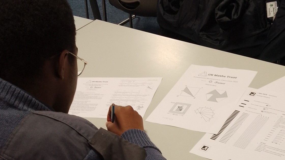 Student 2 with their paper