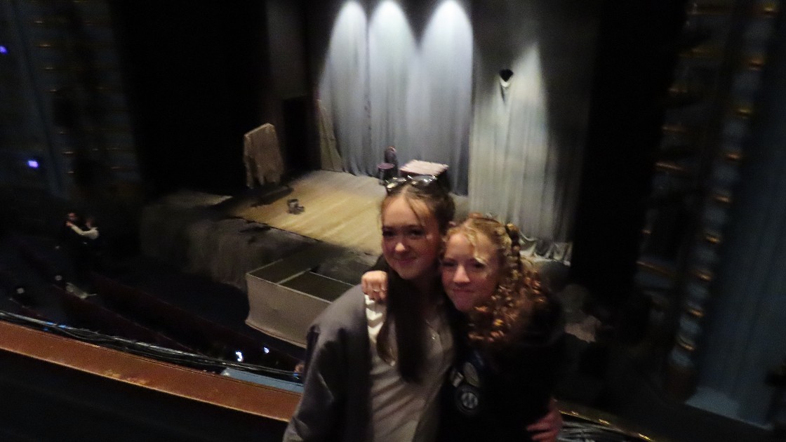 Students in front of the stage