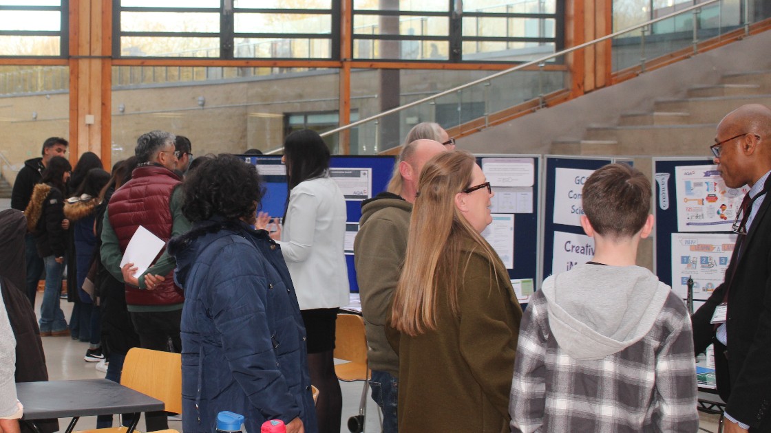 Students and parents/carers speaking to staff.