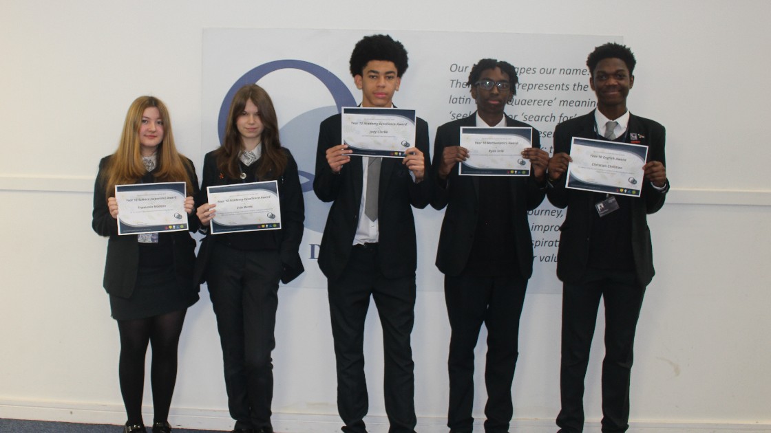 A selection of students with their certificates.