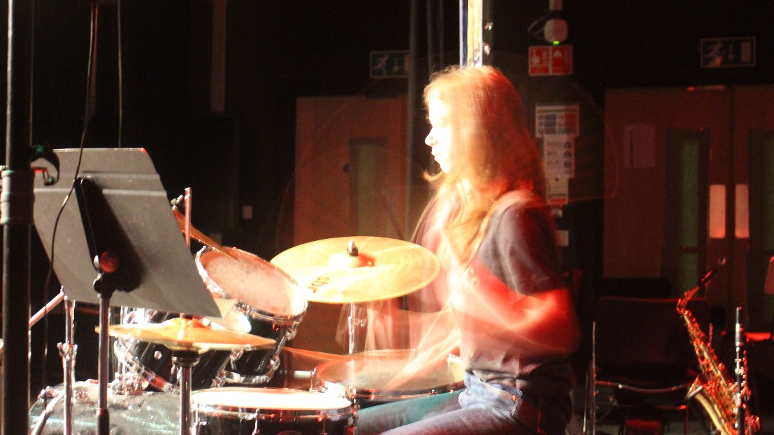 A student drums