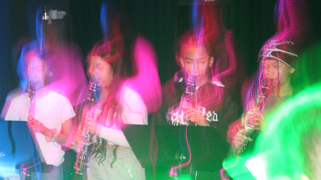 Clarinetists perform.