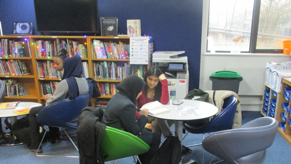 A peer reading session in the our library.