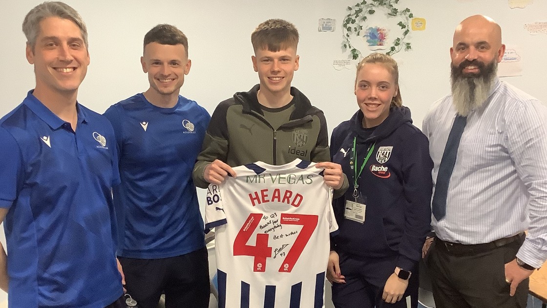 Fenton with Albion foundation mentor Ella and Academy staff