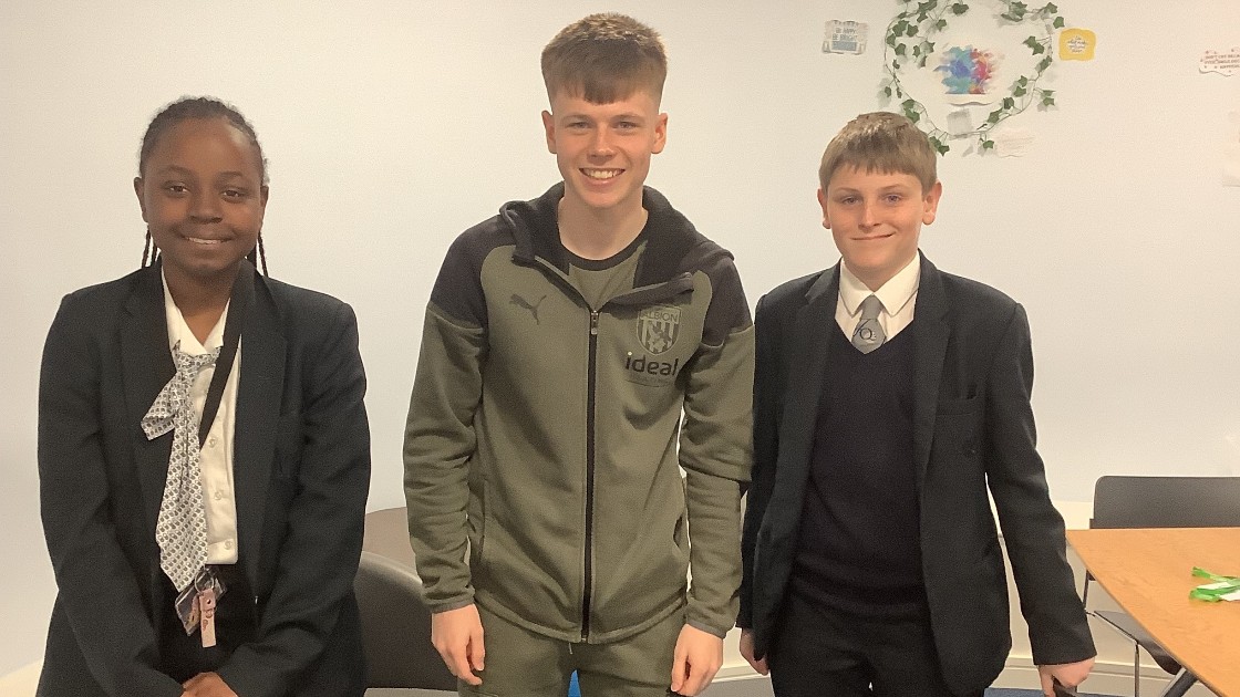 Fenton with two students