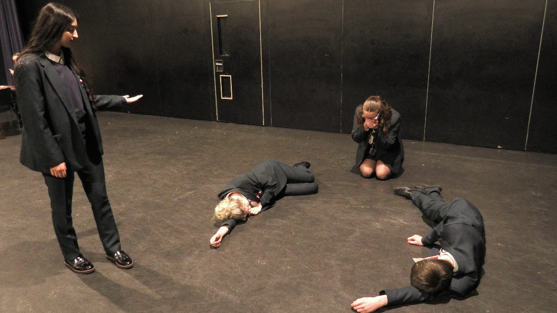 Students acting out key scenes from 'Blood Brothers'.