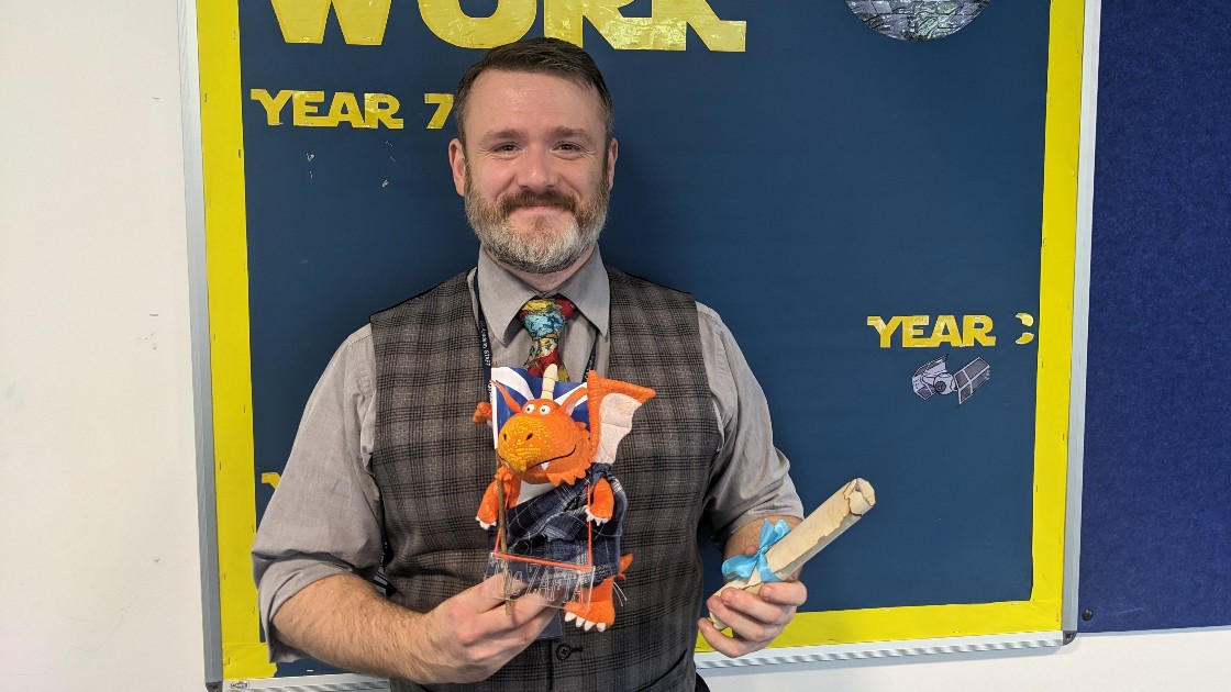Mr Strachan shows off Zog's new tartan