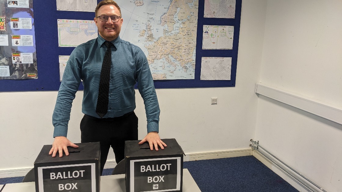 Mr Davies prepares the ballot boxes
