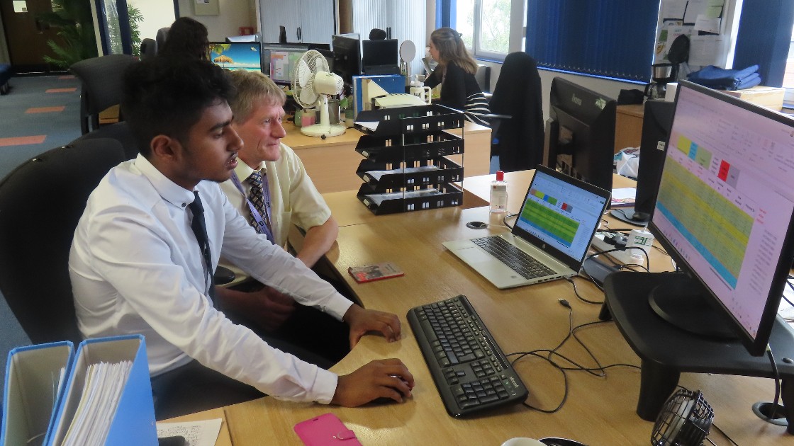 Krish working with the finance team at SIPS