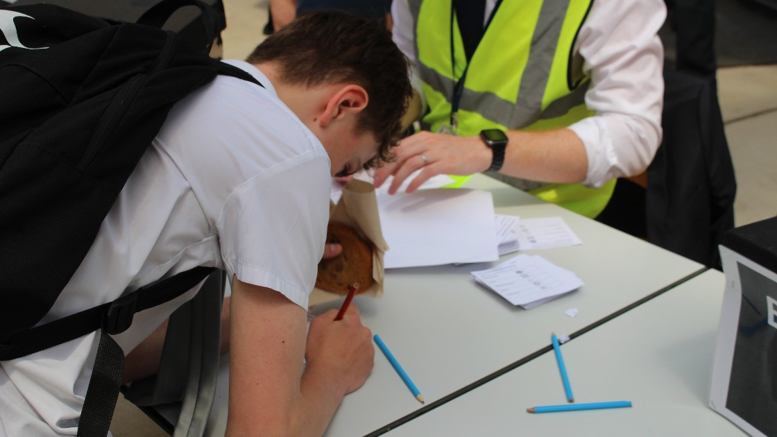 A student completing their ballot.