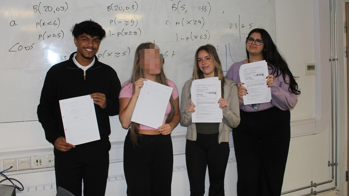 Four of our Year 12 students showing their mock papers