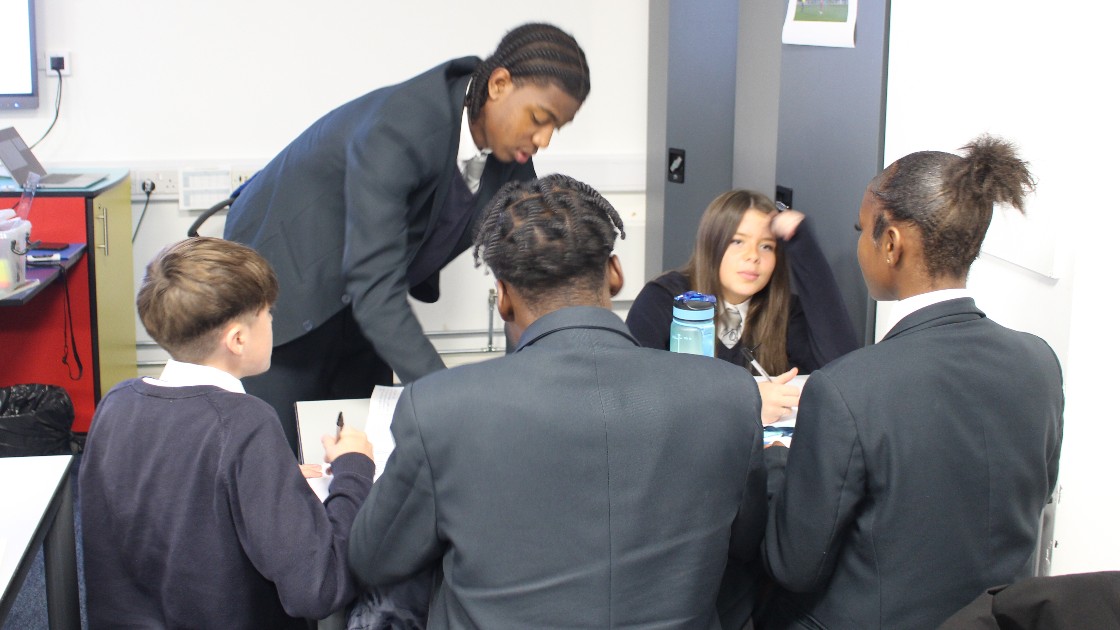 Group discussion applying theoretical ideas to practical examples.
