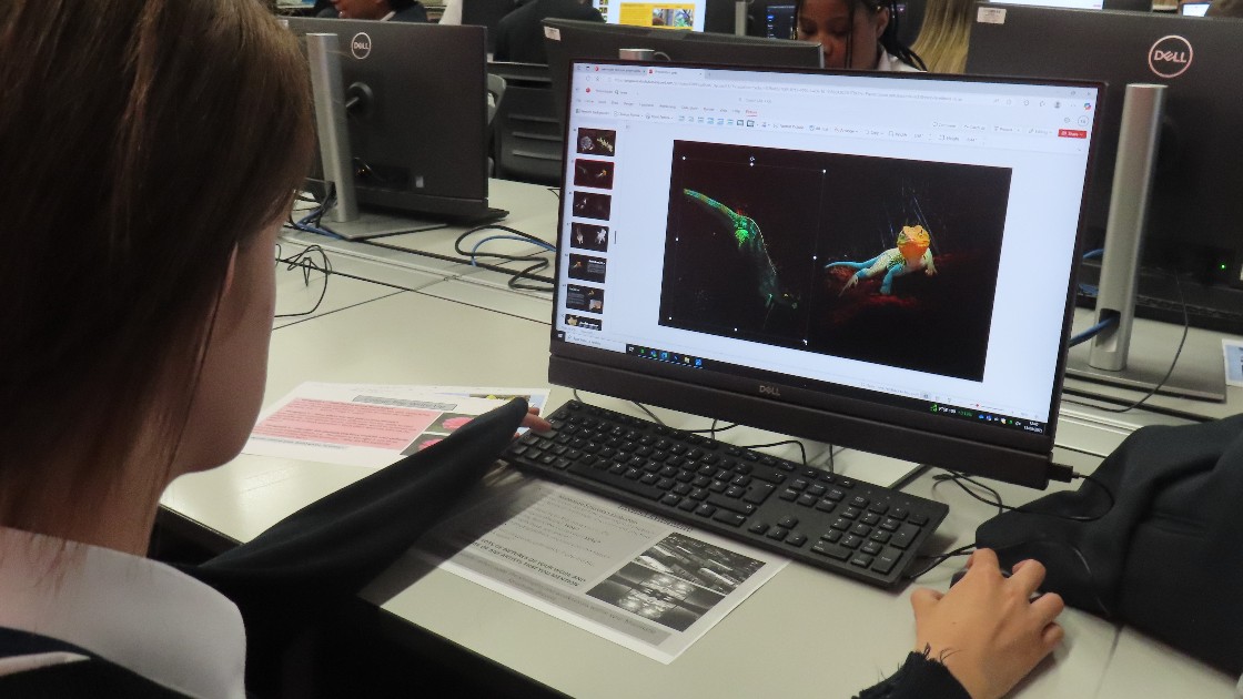 Student working on digital art project on a computer during an Art & Design lesson