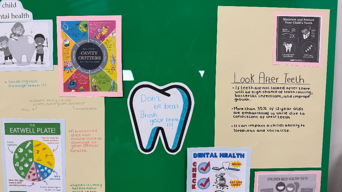 Display board with posters about child dental health and healthy eating!