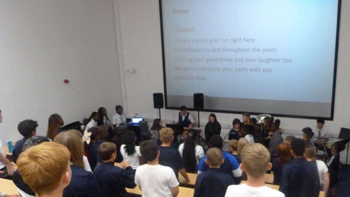 Students and teachers making melodies during our music session